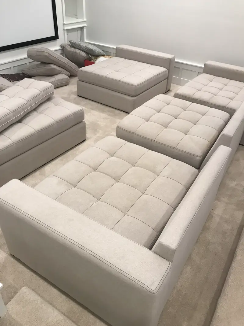 A large pale gray sectional sofa after cleaning