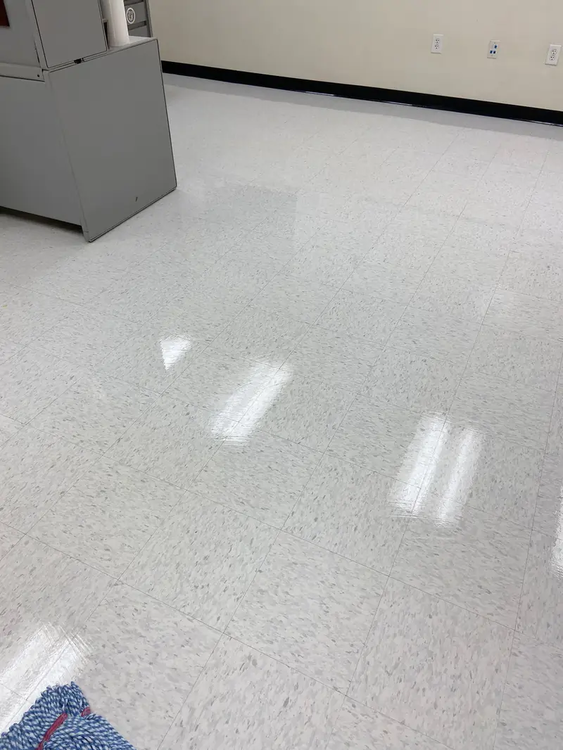 A freshly waxed vinyl tile floor